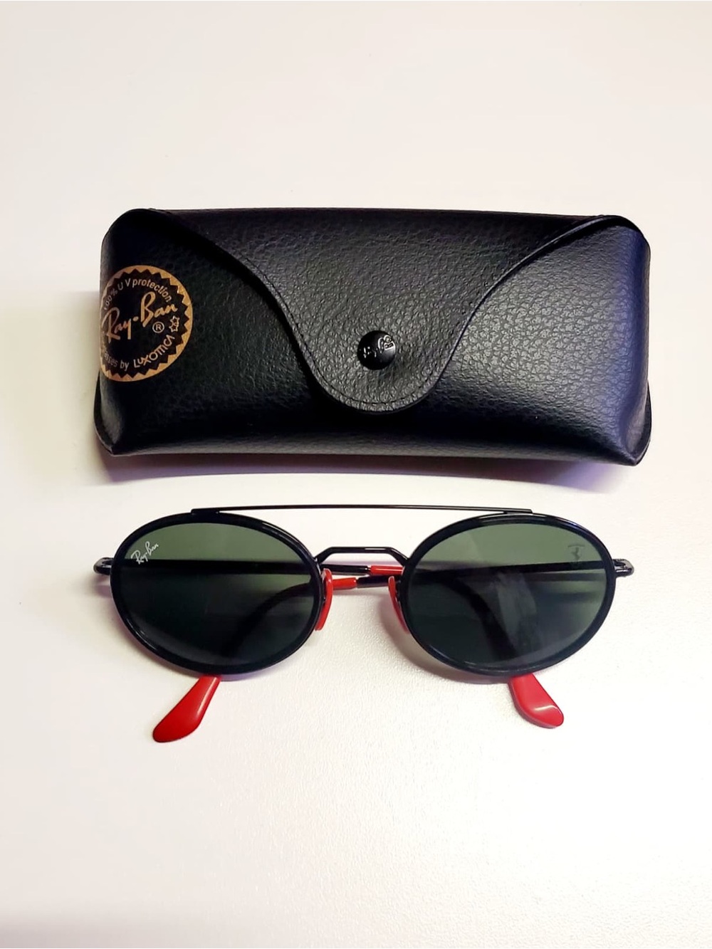 Ray-Ban Black Frame Sunglasses with Red Temples